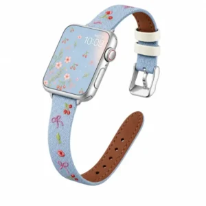 Light blue denim style vegan leather apple watch strap for women with embroidered cherries and pink bows.