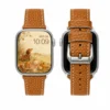 Pumpkin brown Vegan PU Leather Apple Watch Strap with white stitching and slim tapered design.