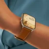 Pumpkin brown Vegan PU Leather Apple Watch Strap with white stitching and slim tapered design.