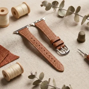 Pumpkin brown Vegan PU Leather Apple Watch Strap with white stitching and slim tapered design.