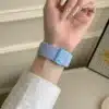 Baby blue kitten braided loop Apple Watch band, comfortable adjustable nylon strap with magnetic clasp.