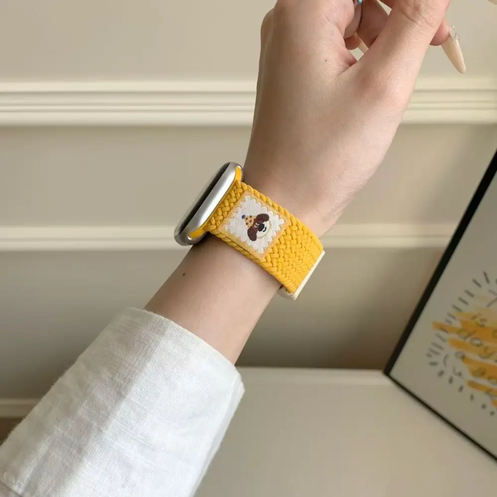 Buttercream yellow puppy braided loop Apple Watch band, comfortable adjustable nylon strap.