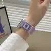 Lavender purple kitten braided loop Apple Watch band for women, comfortable adjustable nylon strap with magnetic clasp.
