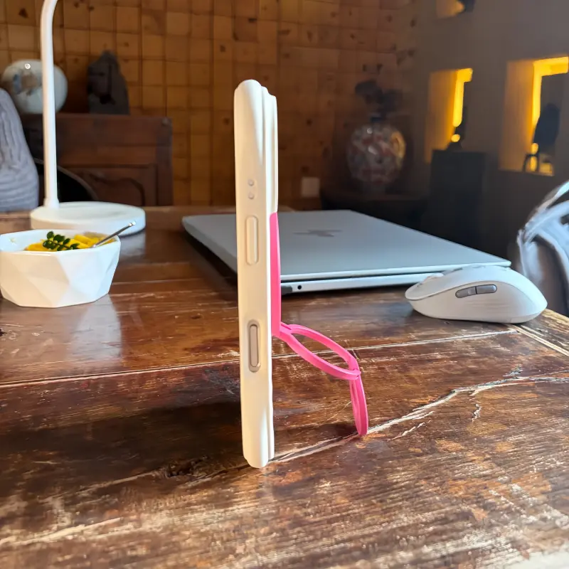 Lilac Sunday pink MagSafe phone stand in yellow, 0.5cm ultra-slim foldable magnetic grip for iPhone.