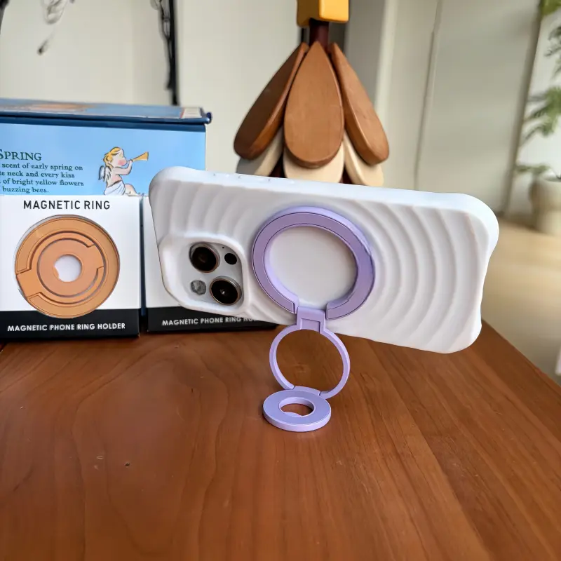 Lilac Sunday purple MagSafe phone stand in yellow, 0.5cm ultra-slim foldable magnetic grip for iPhone.