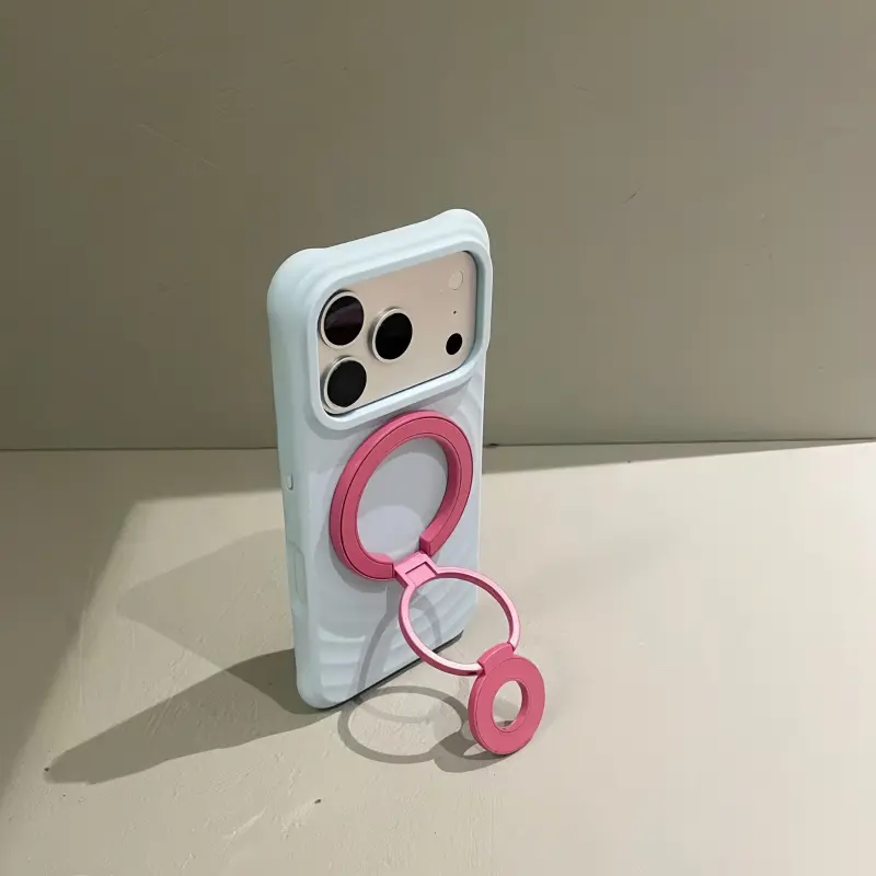 Rose Magenta foldable MagSafe stand for iPhone, adjustable multi-angle magnetic phone holder for desk and video calls.