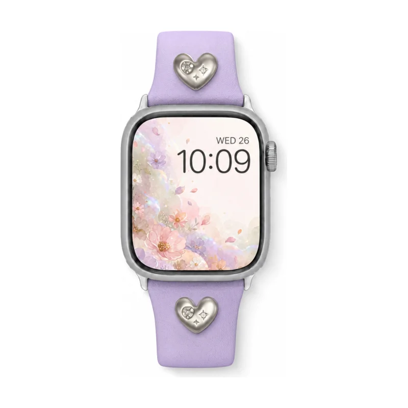 Lilac purple leather Apple Watch band for women with a silver metal heart charm.
