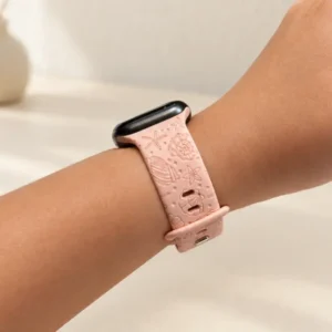Blush Coral Silicone Apple Watch Strap for women featuring soft pastel pink engraved starfish and seashell patterns.