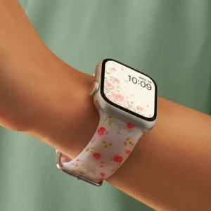 Pink rose floral frosted silicone Apple Watch band replacement wristband for women with silver buckle.