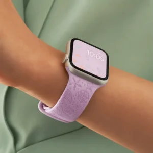 Lilac Coral Silicone Apple Watch Strap for women featuring soft pastel purple engraved starfish and seashell patterns.