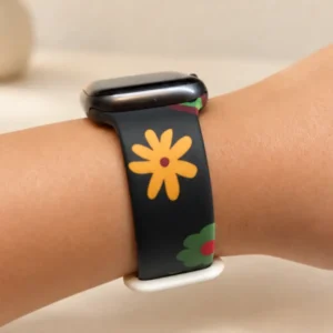 Retro Poppy silicone Apple Watch band with colorful abstract flowers on a black background, comfortable strap for women.