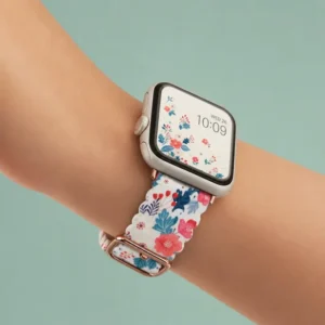 Vintage & adorable floral Apple Watch band for women featuring a wavy edge and deep blue and pink pattern.
