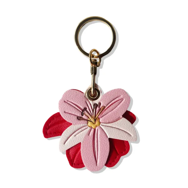 Yellow vegan leather lily flower AirTag case with gold keyring, cute AirTag holder for keys and bags