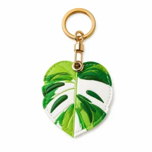 Monstera leaf vegan leather AirTag case in green and white with gold keyring clasp, cute AirTag holder for women