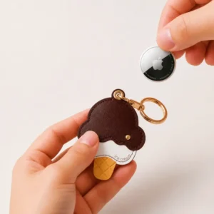 Vegan leather AirTag case shaped like a chocolate ice cream cone with gold keyring, cute AirTag holder for women