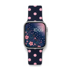 Black Apple Watch band for women with bubblegum pink polka dots, comfortable silicone replacement strap.