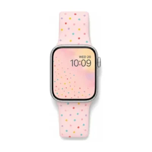 Blush pink Apple Watch band for women with pastel rainbow confetti polka dots, soft silicone replacement strap.