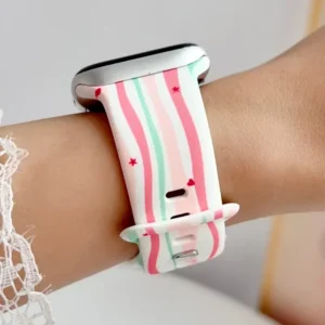 Pink and mint candy stripe Apple Watch band for women with hearts and stars, comfortable silicone strap.