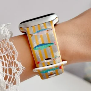 Golden stripe sardine fish Apple Watch band for women, comfortable silicone replacement strap in yellow.