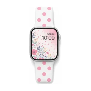 White Apple Watch band for women with bubblegum pink polka dots, comfortable silicone replacement strap.
