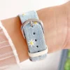 denim daisy Apple Watch Band for women. Comfortable, premium vegan leather replacement wristband with a floral design.