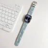 denim daisy Apple Watch Band for women. Comfortable, premium vegan leather replacement wristband with a floral design.