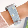 denim daisy Apple Watch Band for women. Comfortable, premium vegan leather replacement wristband with a floral design.