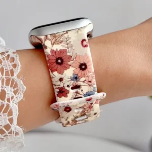 Terracotta daisy and cosmos floral Apple Watch band for women, comfortable silicone replacement strap.
