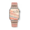 Slim coral boucle tweed Apple Watch band for women, comfortable vegan leather replacement strap with woven stripes.