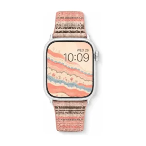Slim coral boucle tweed Apple Watch band for women, comfortable vegan leather replacement strap with woven stripes.