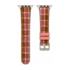 Slim rose tartan tweed Apple Watch band for women, comfortable vegan leather replacement strap in pink check.
